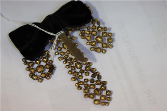 A late 18th century French pinchbeck and shaped cut garnet set drop hair ornament, 10cm.